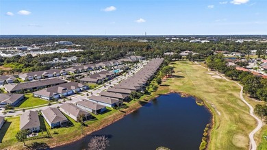 Wait until you see this FABULOUS WATERFRONT HOME overlooking the on Freedom Fairways in Florida - for sale on GolfHomes.com, golf home, golf lot