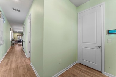 Wait until you see this FABULOUS WATERFRONT HOME overlooking the on Freedom Fairways in Florida - for sale on GolfHomes.com, golf home, golf lot