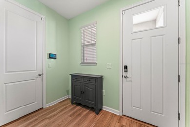 Wait until you see this FABULOUS WATERFRONT HOME overlooking the on Freedom Fairways in Florida - for sale on GolfHomes.com, golf home, golf lot