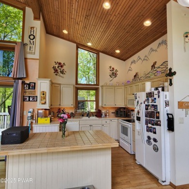 This beautifully designed home offers the perfect blend of on Lords Valley Country Club, Inc in Pennsylvania - for sale on GolfHomes.com, golf home, golf lot