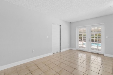 One or more photo(s) has been virtually staged. This home has on Jacaranda West Country Club in Florida - for sale on GolfHomes.com, golf home, golf lot
