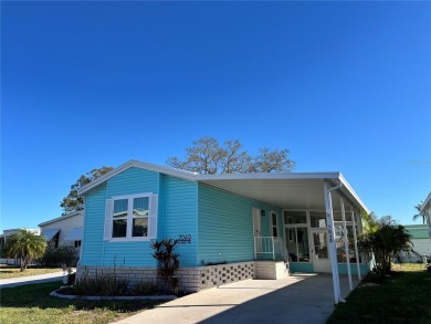 Enjoy the perfect blend of style & comfort in this partially on Mangrove Bay Golf Course in Florida - for sale on GolfHomes.com, golf home, golf lot
