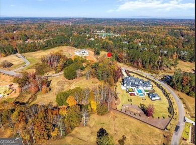This charming 5.48-acre interior estate lot is situated in the on Trophy Club of Atlanta in Georgia - for sale on GolfHomes.com, golf home, golf lot