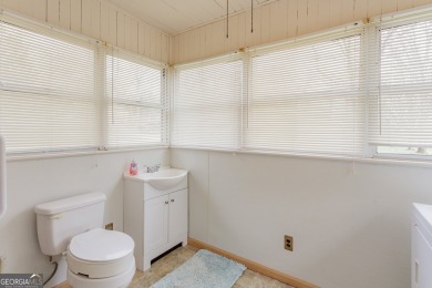 Y'all, come on in and let this custom-built 3-bedroom on High Point Golf Course in Georgia - for sale on GolfHomes.com, golf home, golf lot