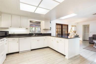 Located in the highly desirable Tuscawilla community, this home on Tuscawilla Country Club in Florida - for sale on GolfHomes.com, golf home, golf lot