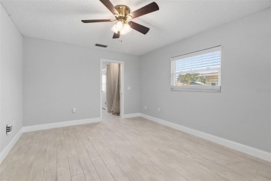 One or more photo(s) has been virtually staged. This home has on Jacaranda West Country Club in Florida - for sale on GolfHomes.com, golf home, golf lot