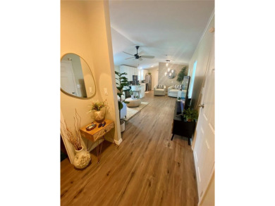 Enjoy the perfect blend of style & comfort in this partially on Mangrove Bay Golf Course in Florida - for sale on GolfHomes.com, golf home, golf lot