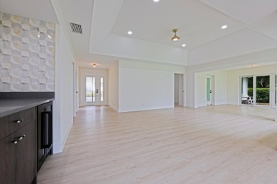 This home in Monarch Country Club is located on the 15th fairway on Monarch Country Club in Florida - for sale on GolfHomes.com, golf home, golf lot