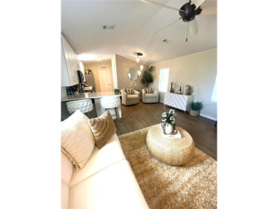 Enjoy the perfect blend of style & comfort in this partially on Mangrove Bay Golf Course in Florida - for sale on GolfHomes.com, golf home, golf lot