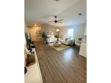 Enjoy the perfect blend of style & comfort in this partially on Mangrove Bay Golf Course in Florida - for sale on GolfHomes.com, golf home, golf lot