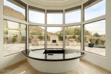 Nestled in a quiet cul-de-sac with sweeping mountain views from on Desert Highlands Golf Club in Arizona - for sale on GolfHomes.com, golf home, golf lot