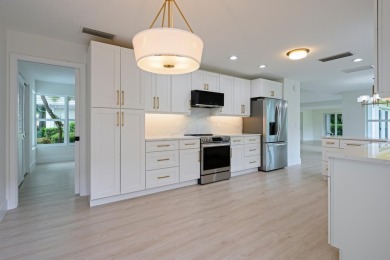 This home in Monarch Country Club is located on the 15th fairway on Monarch Country Club in Florida - for sale on GolfHomes.com, golf home, golf lot