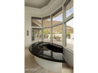 Nestled in a quiet cul-de-sac with sweeping mountain views from on Desert Highlands Golf Club in Arizona - for sale on GolfHomes.com, golf home, golf lot