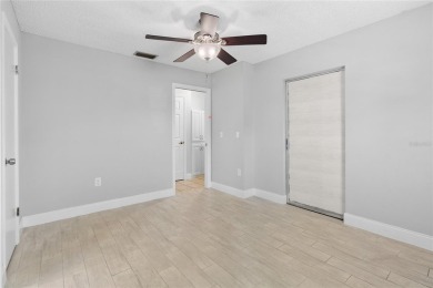 One or more photo(s) has been virtually staged. This home has on Jacaranda West Country Club in Florida - for sale on GolfHomes.com, golf home, golf lot