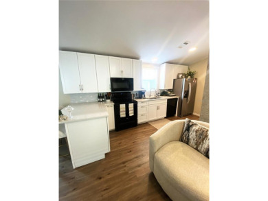 Enjoy the perfect blend of style & comfort in this partially on Mangrove Bay Golf Course in Florida - for sale on GolfHomes.com, golf home, golf lot