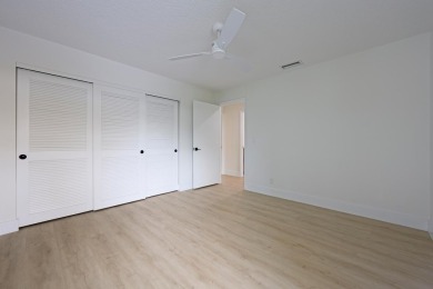 This home in Monarch Country Club is located on the 15th fairway on Monarch Country Club in Florida - for sale on GolfHomes.com, golf home, golf lot