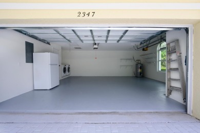 This home in Monarch Country Club is located on the 15th fairway on Monarch Country Club in Florida - for sale on GolfHomes.com, golf home, golf lot