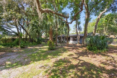 Located in the highly desirable Tuscawilla community, this home on Tuscawilla Country Club in Florida - for sale on GolfHomes.com, golf home, golf lot