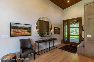Nestled against the Bridger-Teton National Forest, 15415 Tall on Snake River Sporting Club in Wyoming - for sale on GolfHomes.com, golf home, golf lot