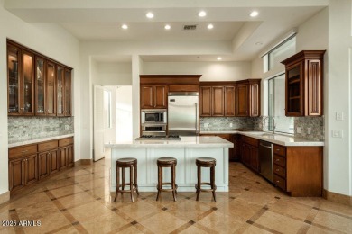 Nestled in a quiet cul-de-sac with sweeping mountain views from on Desert Highlands Golf Club in Arizona - for sale on GolfHomes.com, golf home, golf lot