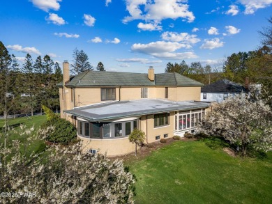 Available for the first time in over 55 years, this iconic on Elkview Country Club in Pennsylvania - for sale on GolfHomes.com, golf home, golf lot