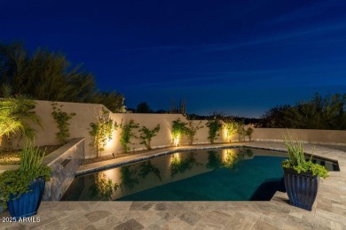 Nestled in a quiet cul-de-sac with sweeping mountain views from on Desert Highlands Golf Club in Arizona - for sale on GolfHomes.com, golf home, golf lot