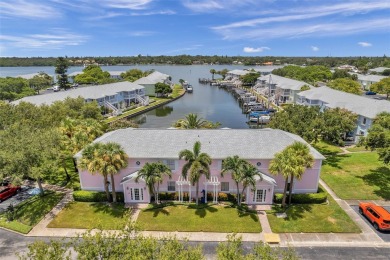 Once you pull through the gate you will not want to leave this on St. Petersburg Country Club in Florida - for sale on GolfHomes.com, golf home, golf lot