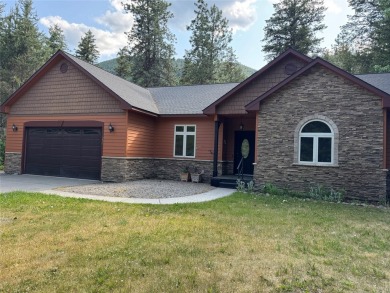 Welcome to your Montana dream retreat! This exceptional property on Trestle Creek Golf Course in Montana - for sale on GolfHomes.com, golf home, golf lot