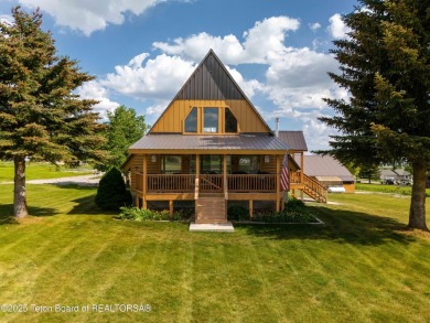 Experience luxury living in this beautiful home, perfectly on Cedar Creek Golf Course in Wyoming - for sale on GolfHomes.com, golf home, golf lot