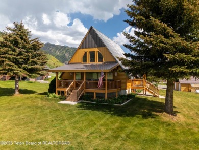 Experience luxury living in this beautiful home, perfectly on Cedar Creek Golf Course in Wyoming - for sale on GolfHomes.com, golf home, golf lot