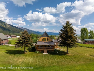 Experience luxury living in this beautiful home, perfectly on Cedar Creek Golf Course in Wyoming - for sale on GolfHomes.com, golf home, golf lot