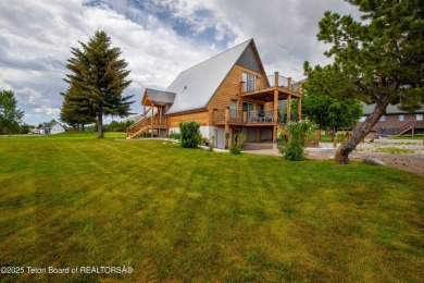 Experience luxury living in this beautiful home, perfectly on Cedar Creek Golf Course in Wyoming - for sale on GolfHomes.com, golf home, golf lot