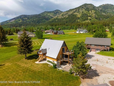Experience luxury living in this beautiful home, perfectly on Cedar Creek Golf Course in Wyoming - for sale on GolfHomes.com, golf home, golf lot