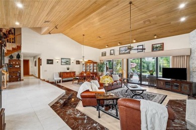 Step into country club living at its finest in this expansive on Pipers Landing Country Club in Florida - for sale on GolfHomes.com, golf home, golf lot