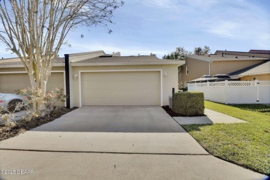 Light-Filled Corner Townhome with Resort-Style Amenities on Victoria Hills Golf Club in Florida - for sale on GolfHomes.com, golf home, golf lot