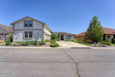 Located on the 12th Fairway, this beautifully-maintained custom on Silver Oak Golf Course in Nevada - for sale on GolfHomes.com, golf home, golf lot