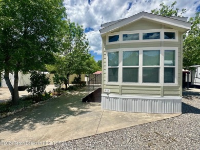 Beautifully maintained, immaculate 2022 CAVCO unit in the Star on Star Valley RV Golf Course in Wyoming - for sale on GolfHomes.com, golf home, golf lot