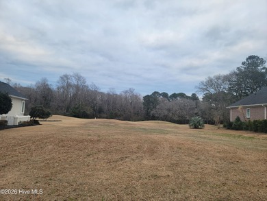 Golf course frontage lot on a quiet cul-de-sac at a bargain on Ocean Ridge Plantation in North Carolina - for sale on GolfHomes.com, golf home, golf lot