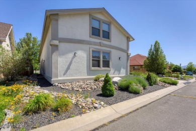 Located on the 12th Fairway, this beautifully-maintained custom on Silver Oak Golf Course in Nevada - for sale on GolfHomes.com, golf home, golf lot