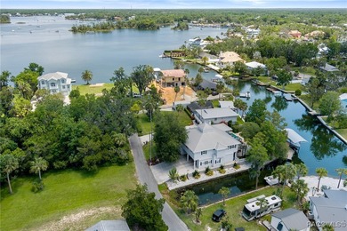 This updated waterfront stilt (DID NOT FLOOD) home in Crystal on Plantation Inn and Golf Resort  in Florida - for sale on GolfHomes.com, golf home, golf lot