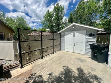 Beautifully maintained, immaculate 2022 CAVCO unit in the Star on Star Valley RV Golf Course in Wyoming - for sale on GolfHomes.com, golf home, golf lot