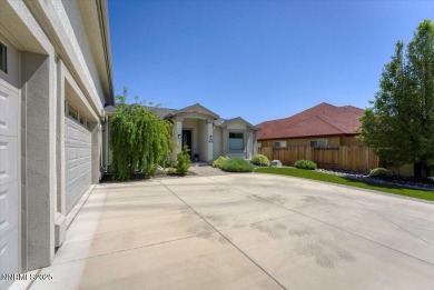 Located on the 12th Fairway, this beautifully-maintained custom on Silver Oak Golf Course in Nevada - for sale on GolfHomes.com, golf home, golf lot