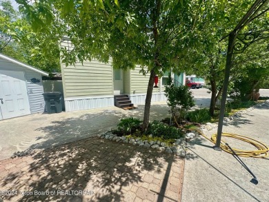 Beautifully maintained, immaculate 2022 CAVCO unit in the Star on Star Valley RV Golf Course in Wyoming - for sale on GolfHomes.com, golf home, golf lot