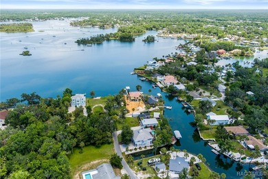 This updated waterfront stilt (DID NOT FLOOD) home in Crystal on Plantation Inn and Golf Resort  in Florida - for sale on GolfHomes.com, golf home, golf lot