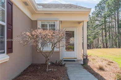 Start and end your days enjoying lagoon and wood views from your on Hidden Cypress Golf Club in South Carolina - for sale on GolfHomes.com, golf home, golf lot