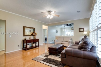 Start and end your days enjoying lagoon and wood views from your on Hidden Cypress Golf Club in South Carolina - for sale on GolfHomes.com, golf home, golf lot