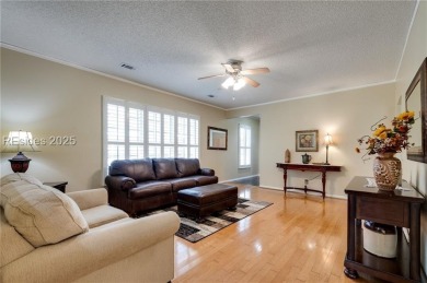 Start and end your days enjoying lagoon and wood views from your on Hidden Cypress Golf Club in South Carolina - for sale on GolfHomes.com, golf home, golf lot