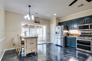 Start and end your days enjoying lagoon and wood views from your on Hidden Cypress Golf Club in South Carolina - for sale on GolfHomes.com, golf home, golf lot