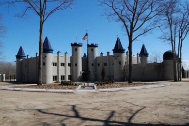 Discover your perfect getaway at this beautiful property nestled on Canadian Lakes Country Club-The Pines Course in Michigan - for sale on GolfHomes.com, golf home, golf lot