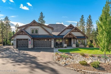 SPECTACULAR AND PRIVATE RETREAT SETTING AMONGST THE TREES IN on Hayden Lake Country Club in Idaho - for sale on GolfHomes.com, golf home, golf lot